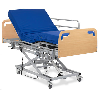 Articulated hospital bed with a lifting car, railings, mattress and fiecero headboard